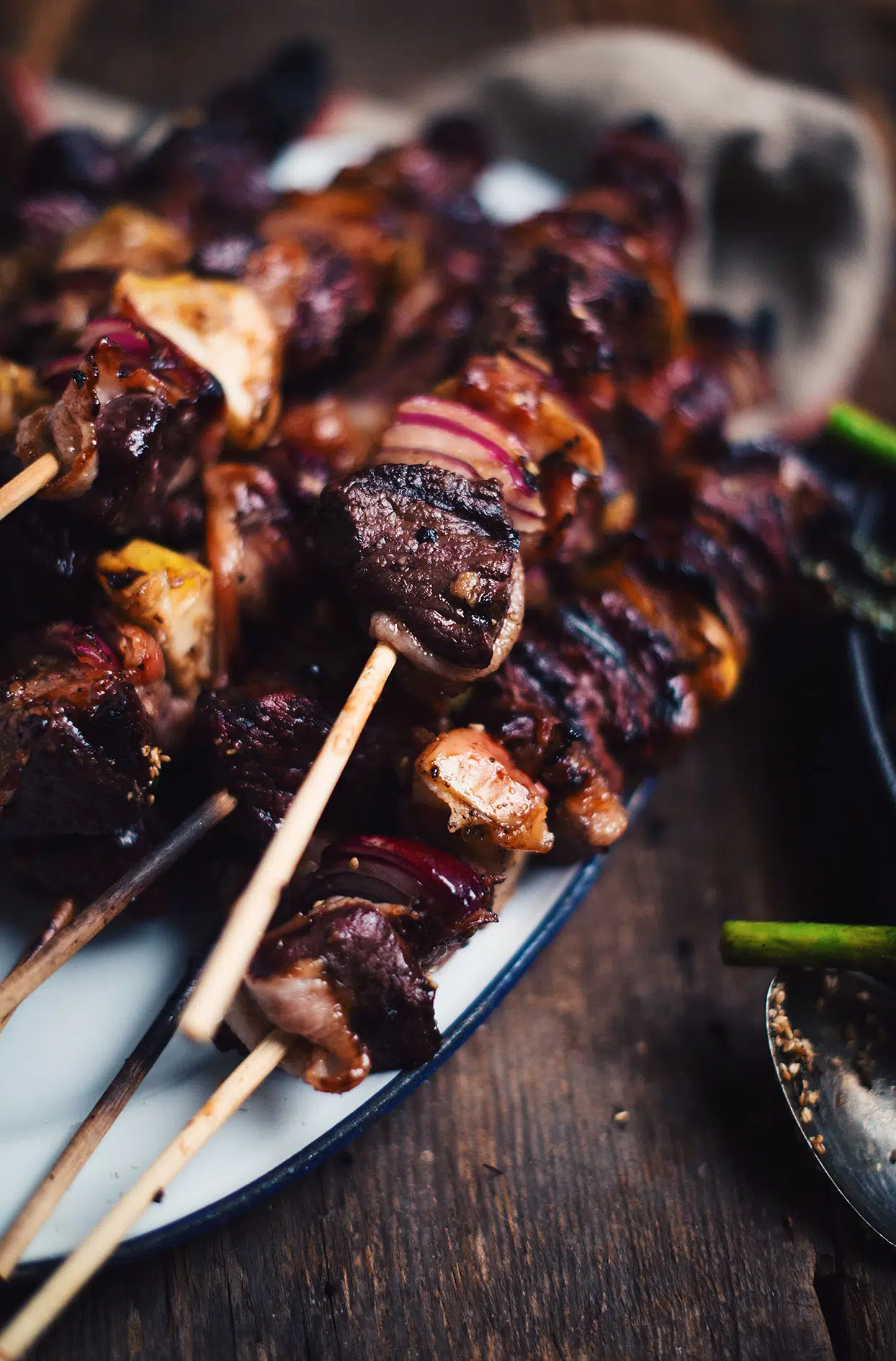 Venison skewers with apples and bacon