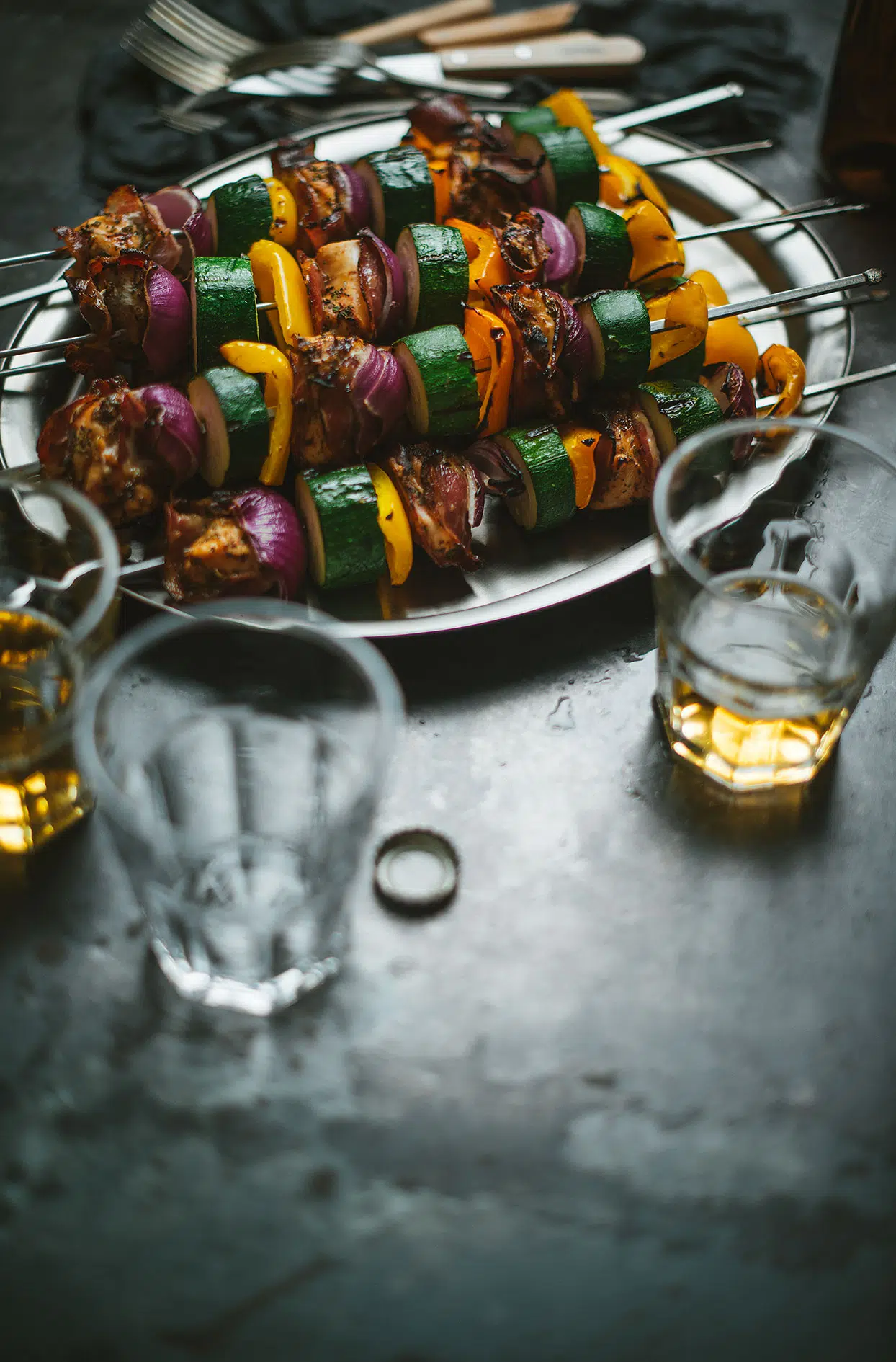 Cajun chicken skewers wrapped in coppa