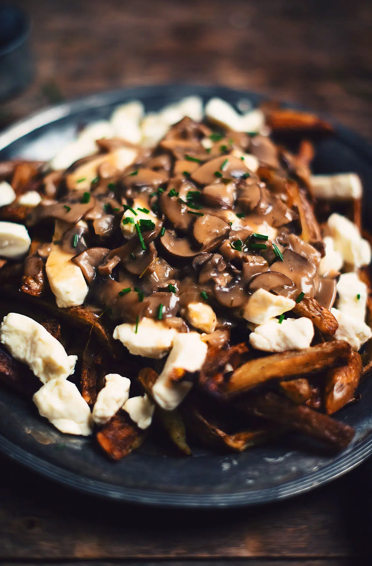 Poutine with wild mushrooms and beer brown sauce