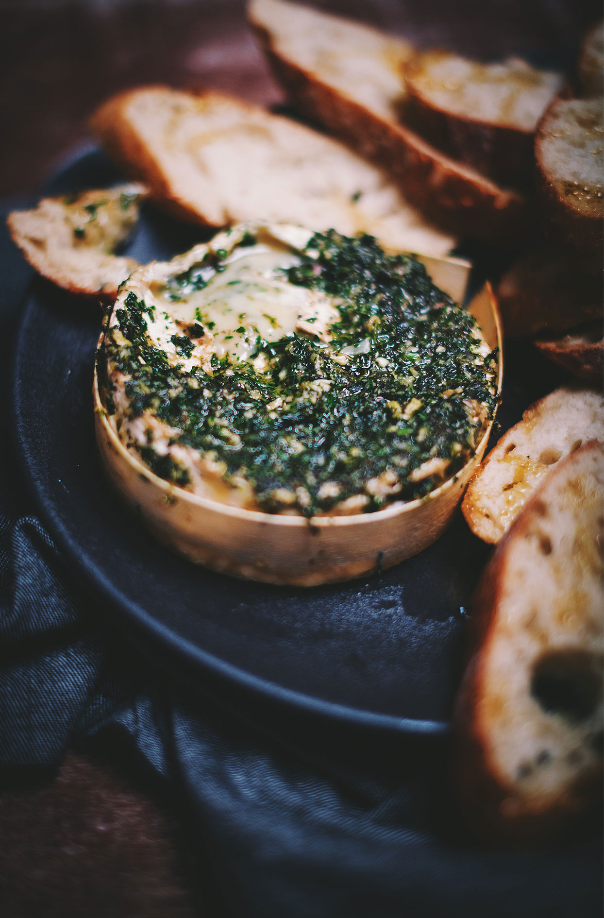 Melting camembert with fine herbs