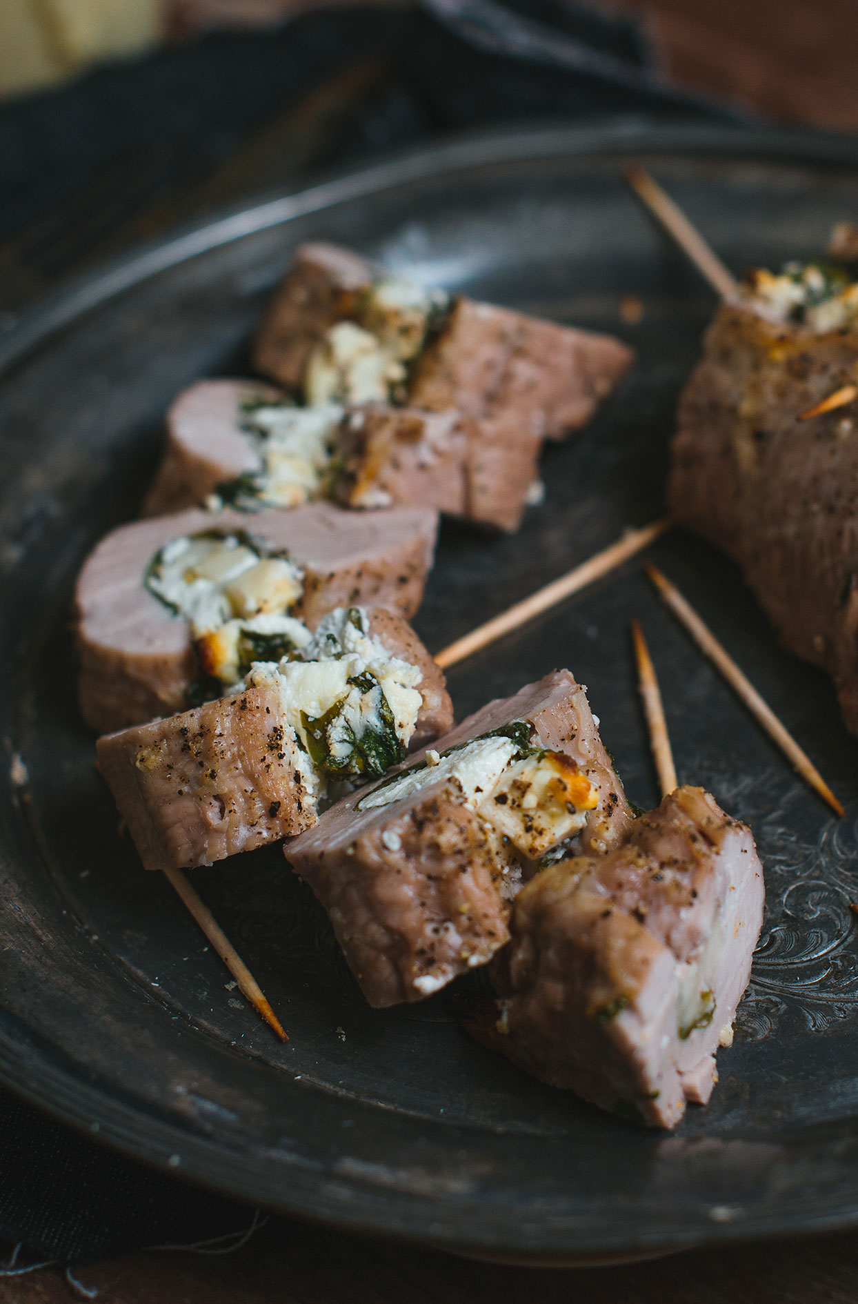 Pork tenderloins stuffed with apples, goat cheese and spinach