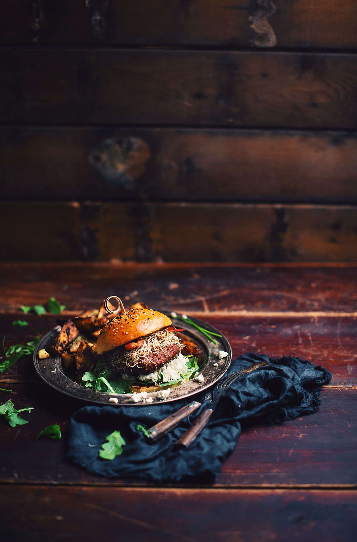 Lamb burger with bacon and goat cheese