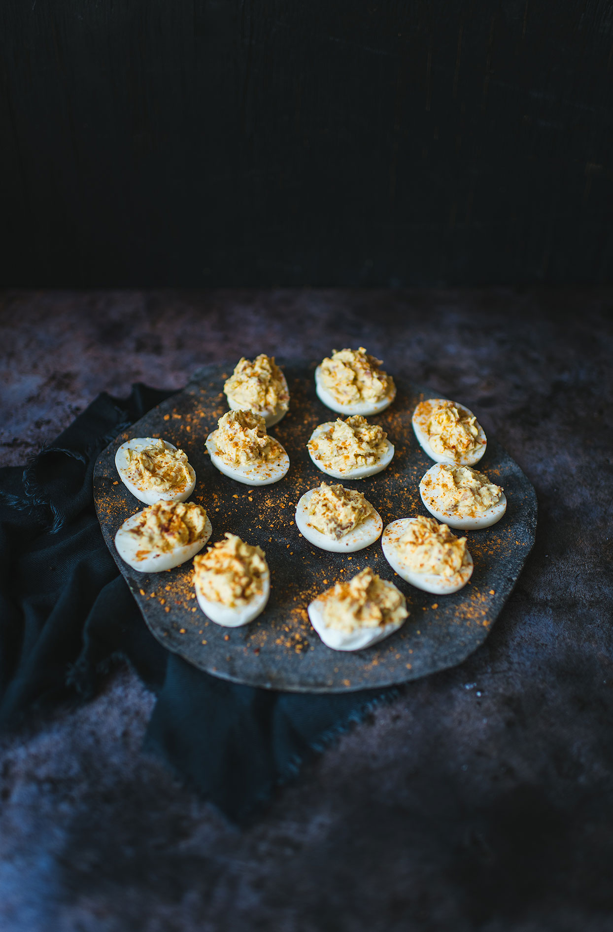 Smoked cheese and bacon deviled eggs