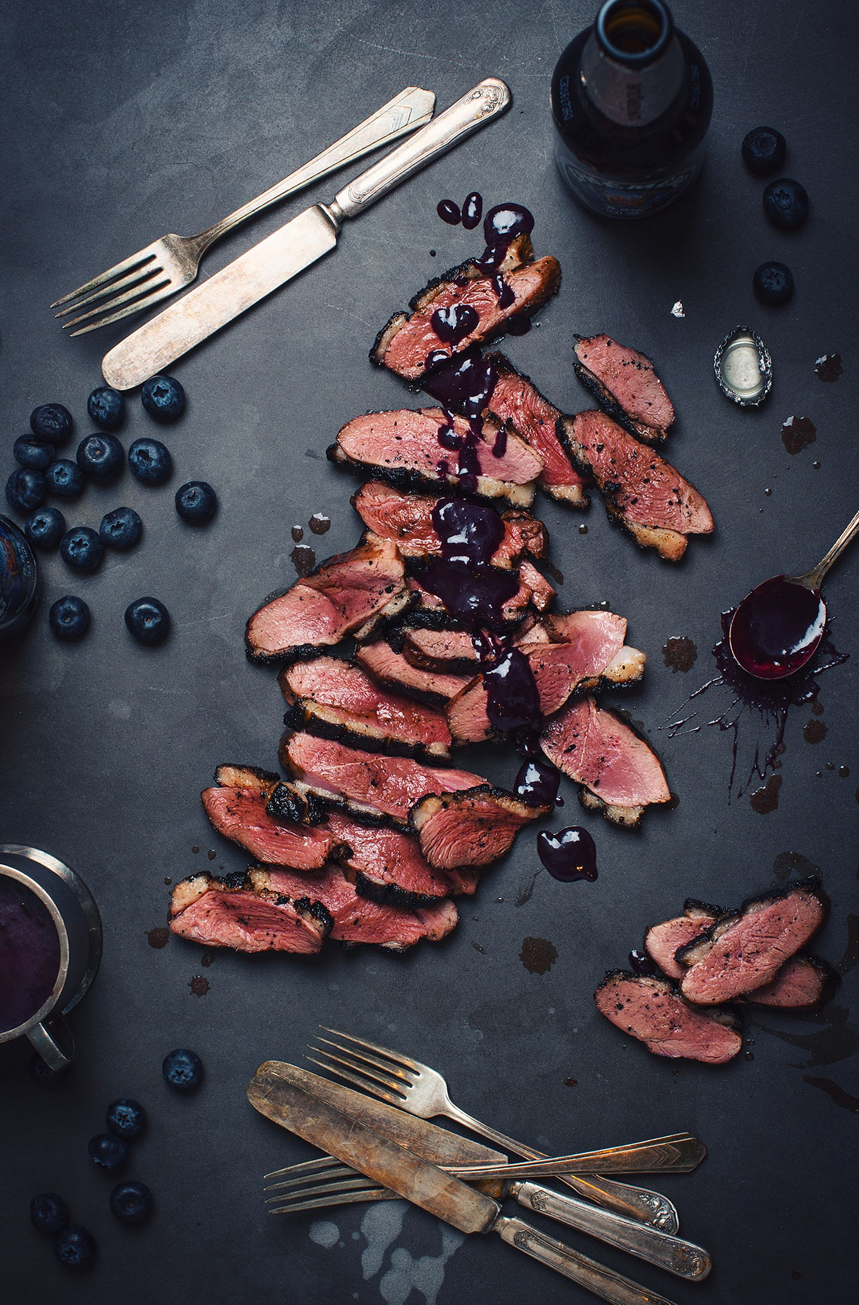 Barbecued duck breasts with blueberry sauce