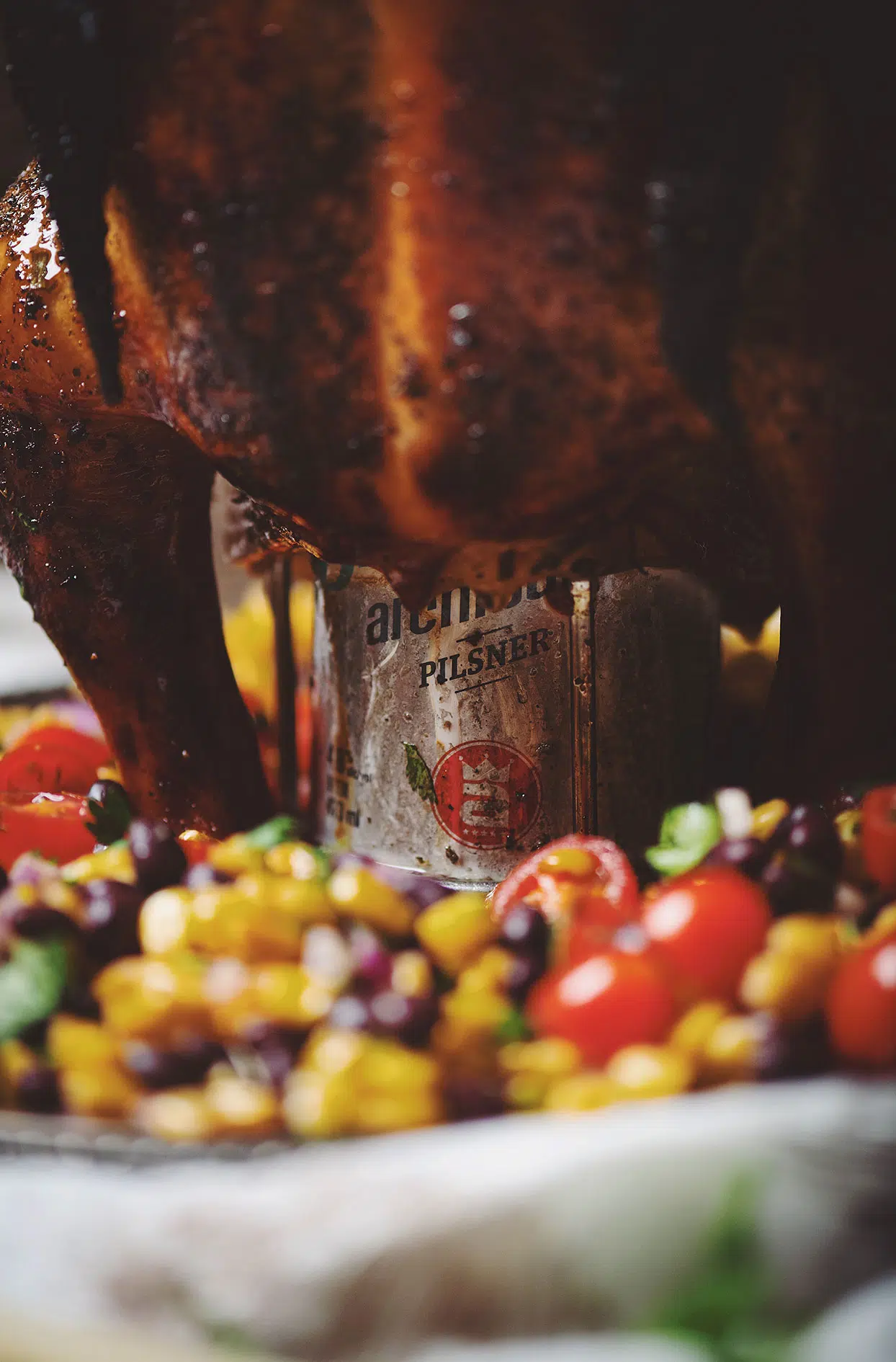 Lime and chili BBQ beer can chicken with corn salad