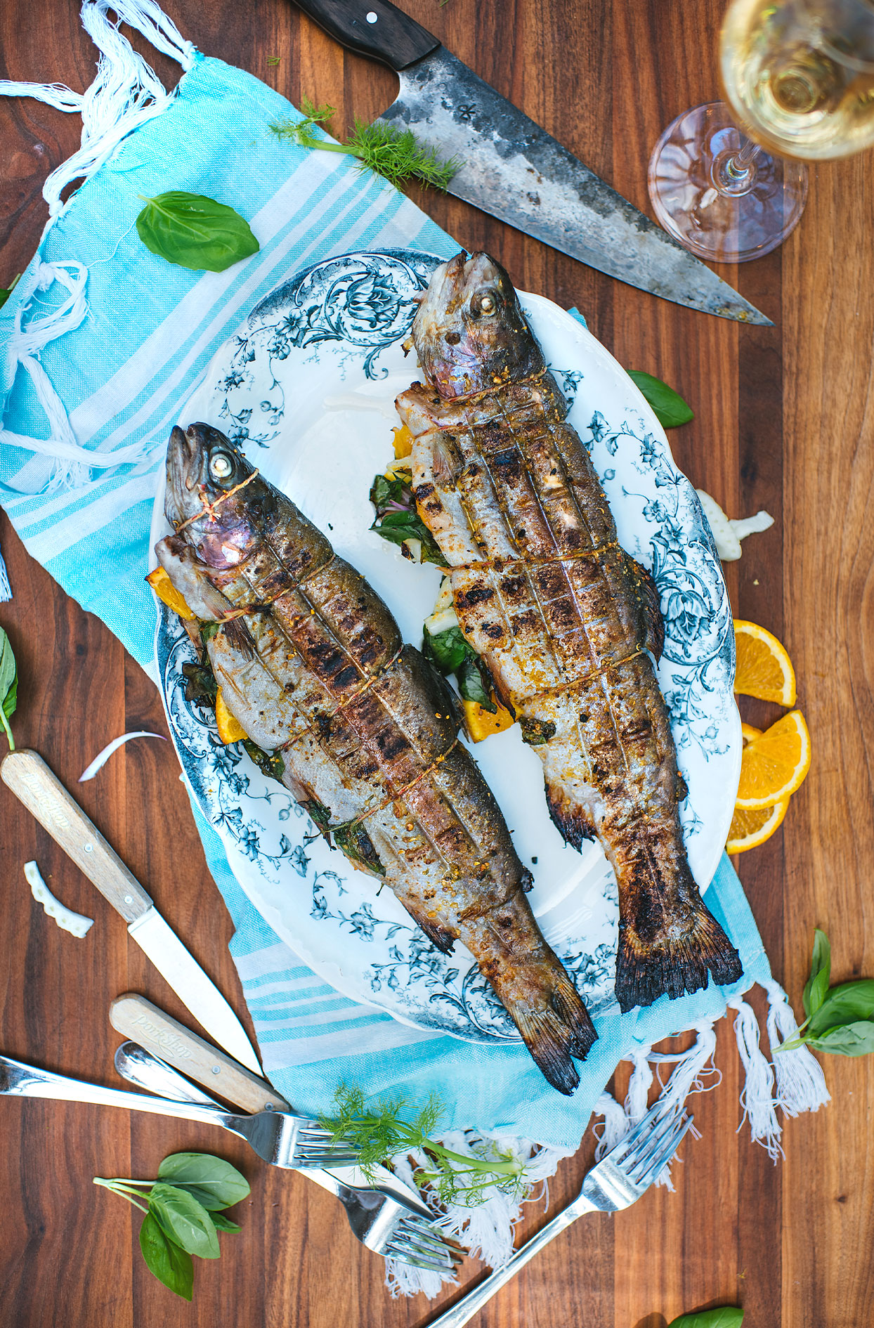 Grilled trout with fennel, orange and basil