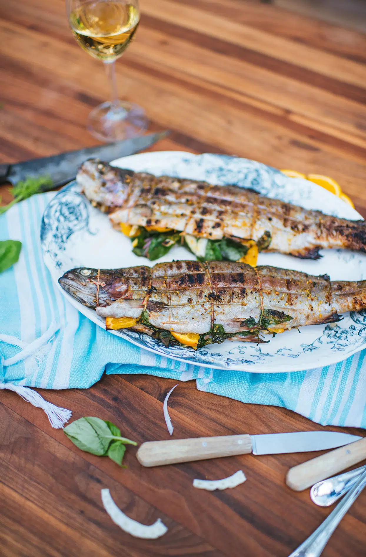 Grilled trout with fennel, orange and basil