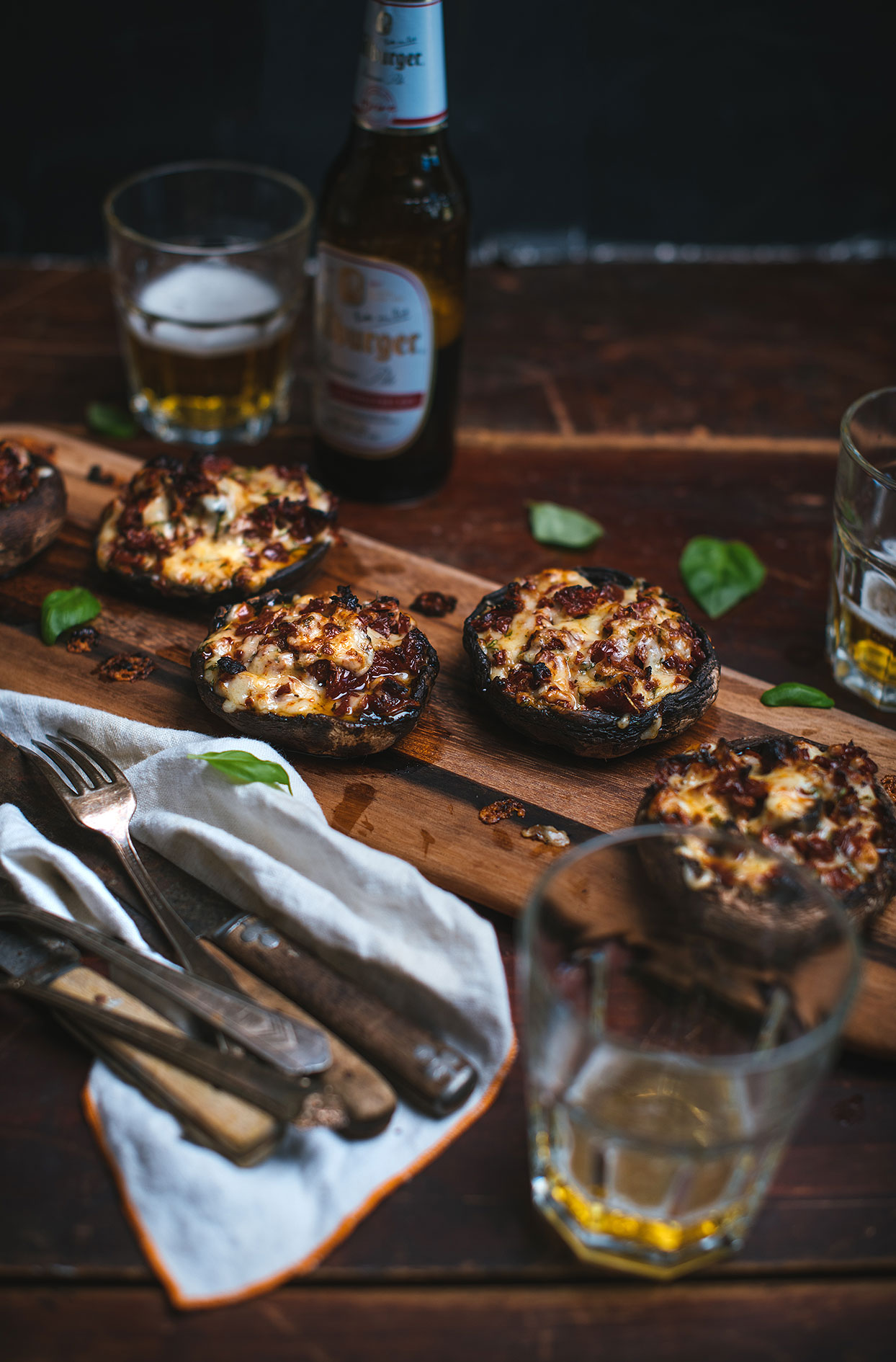 Portobellos stuffed with cheese, sun-dried tomatoes and basil