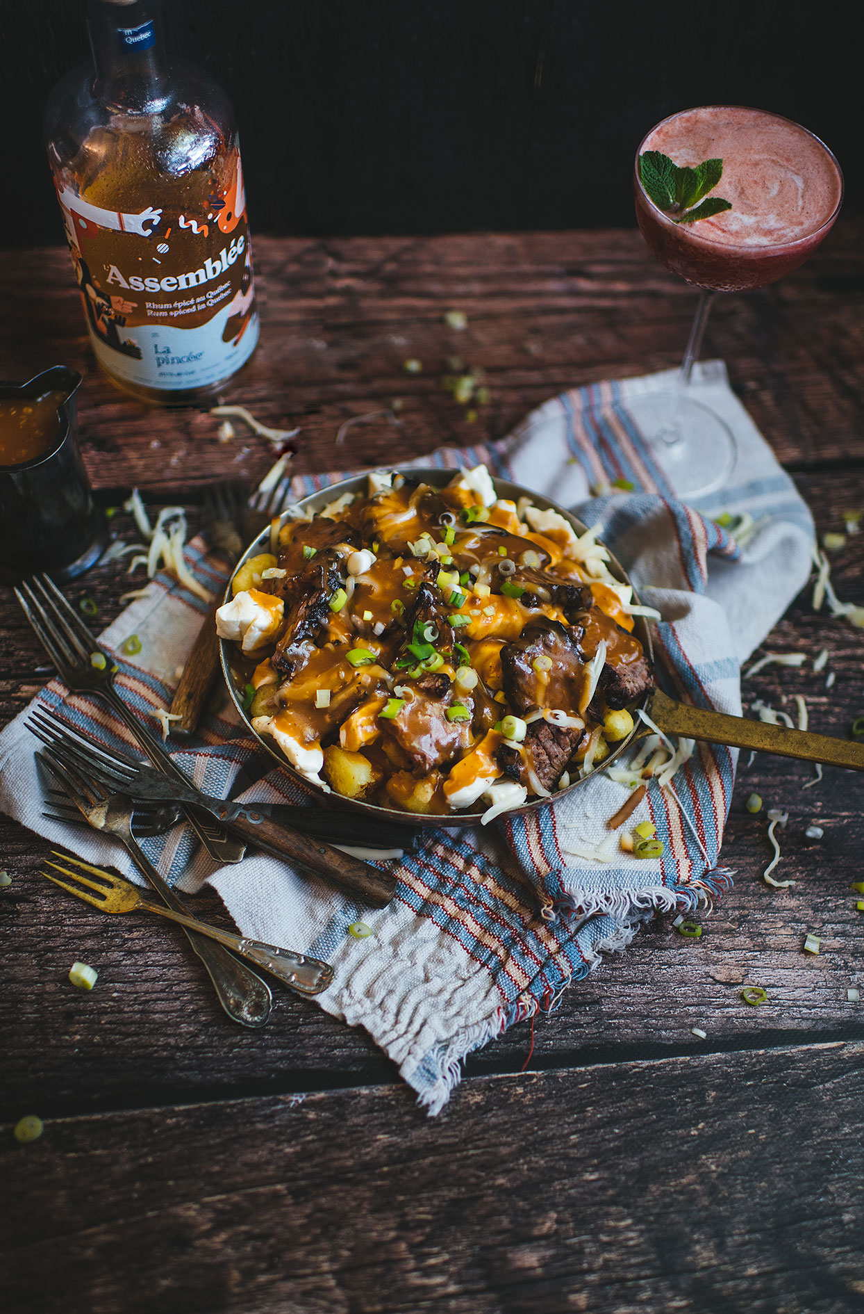 Gnocchi poutine with flank steak and rum sauce