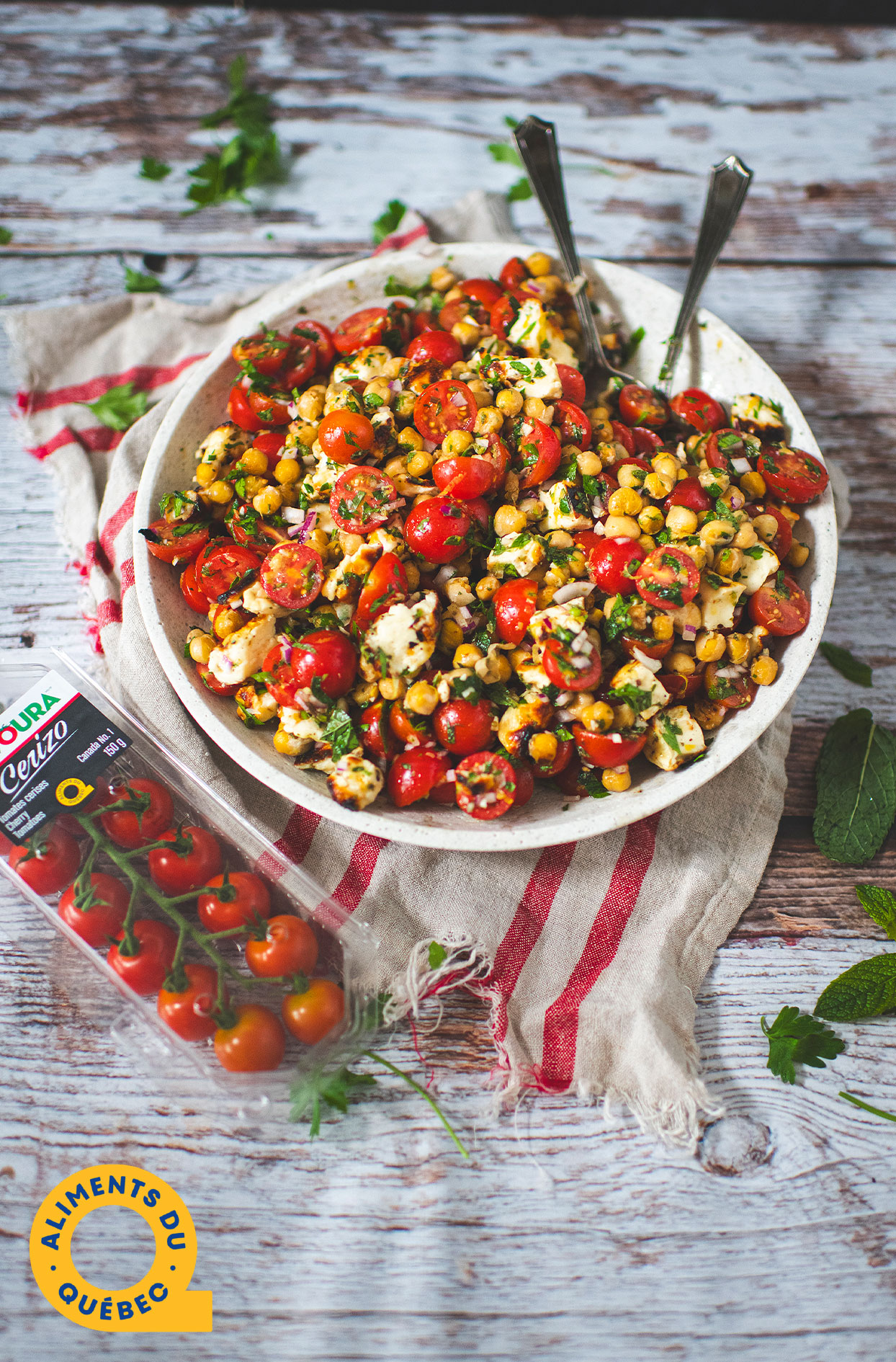 Cherry tomato salad with grilled chickpeas and halloumi