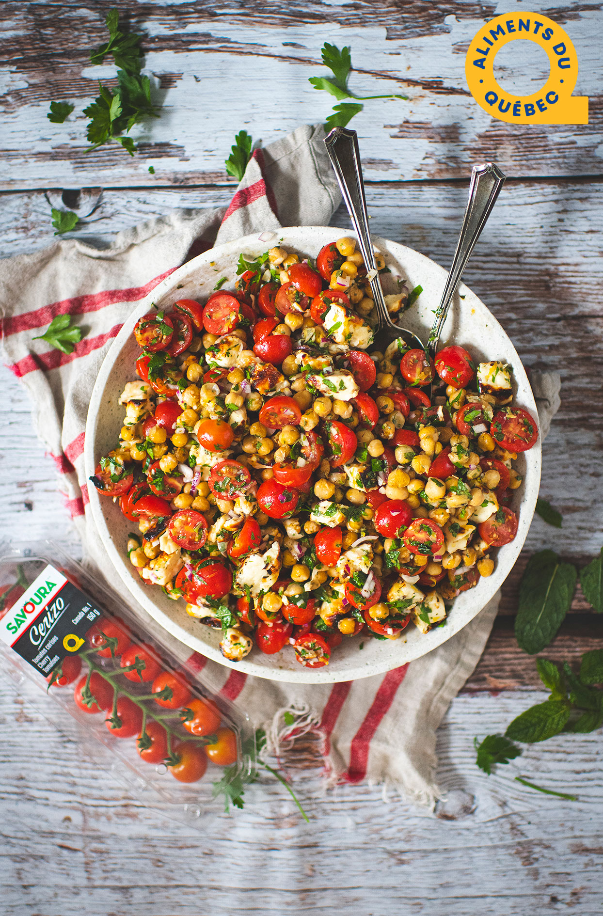 Cherry tomato salad with grilled chickpeas and halloumi