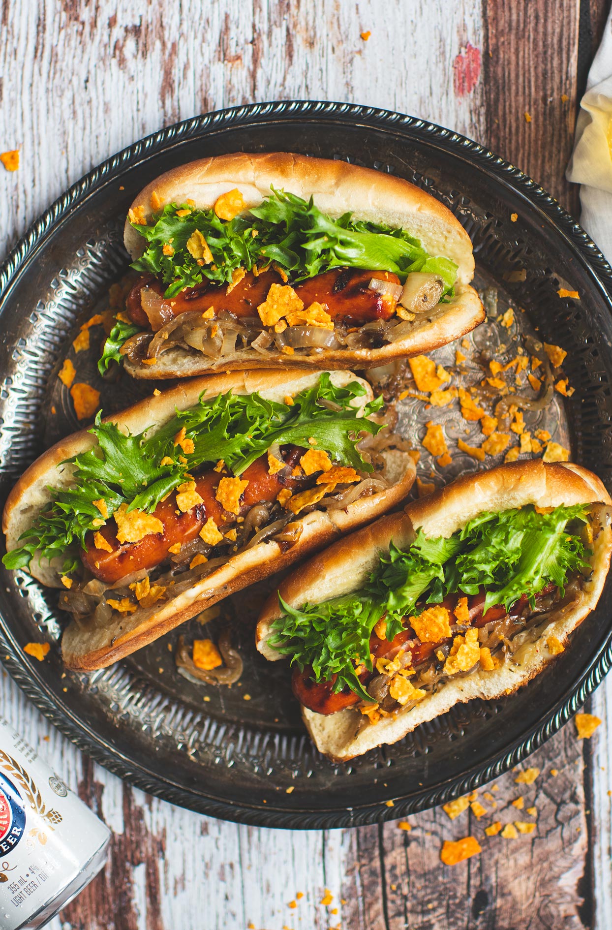 Hot dogs with beer-caramelized onions and Doritos