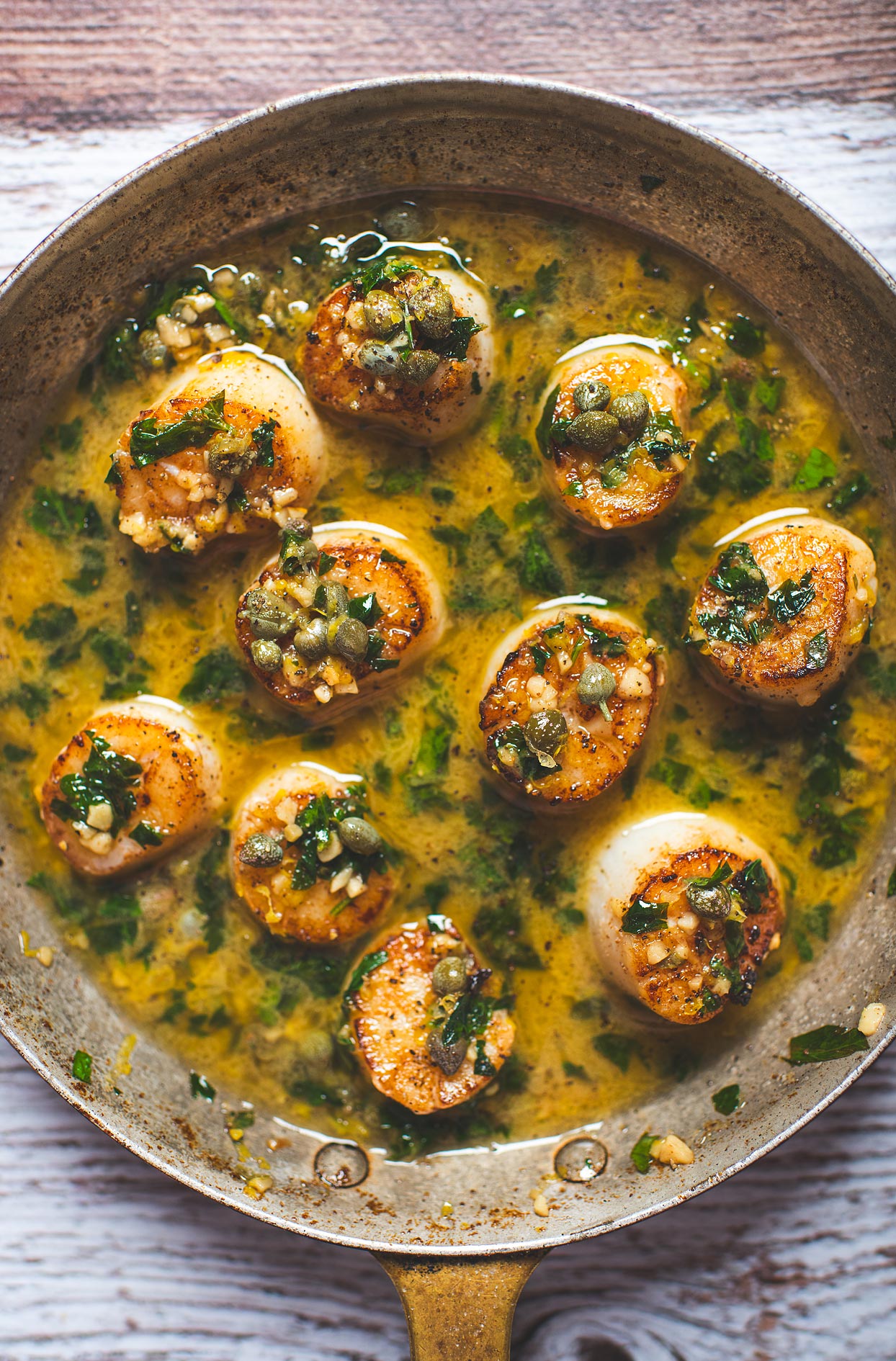 Pan-seared scallops with lemon and caper sauce