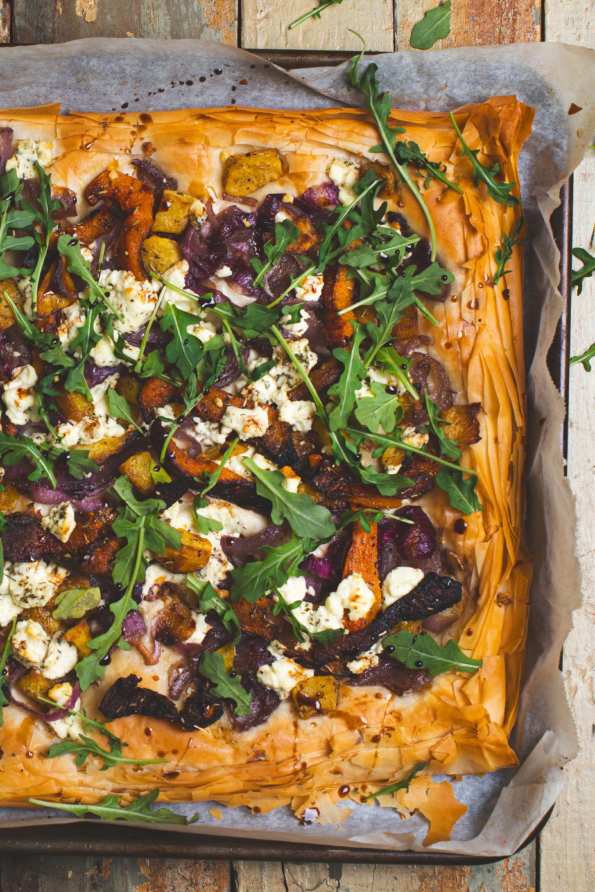 Squash tart with caramelized onions and goat cheese