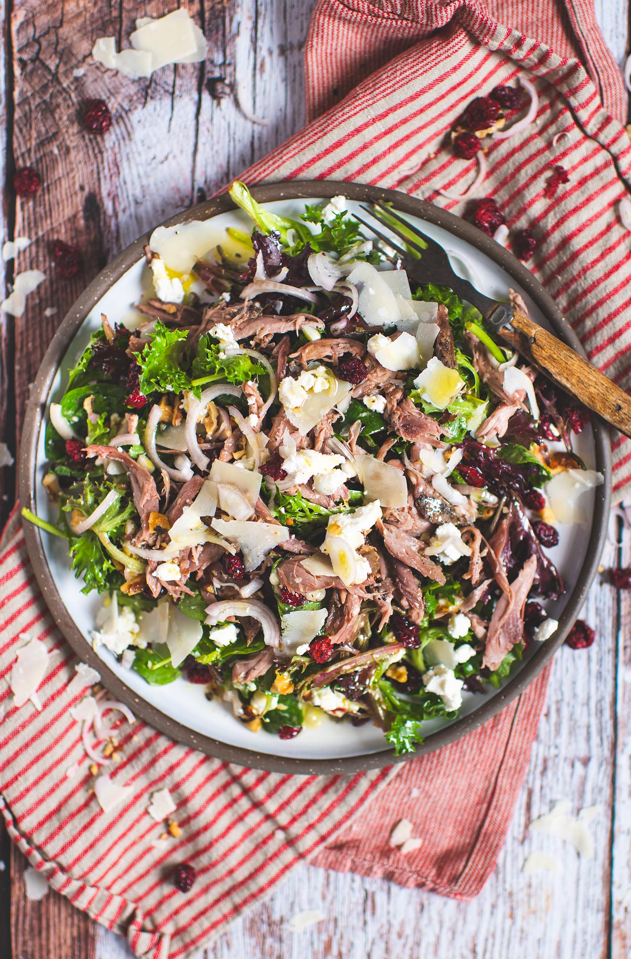 Duck confit salad with goat cheese and honey vinaigrette