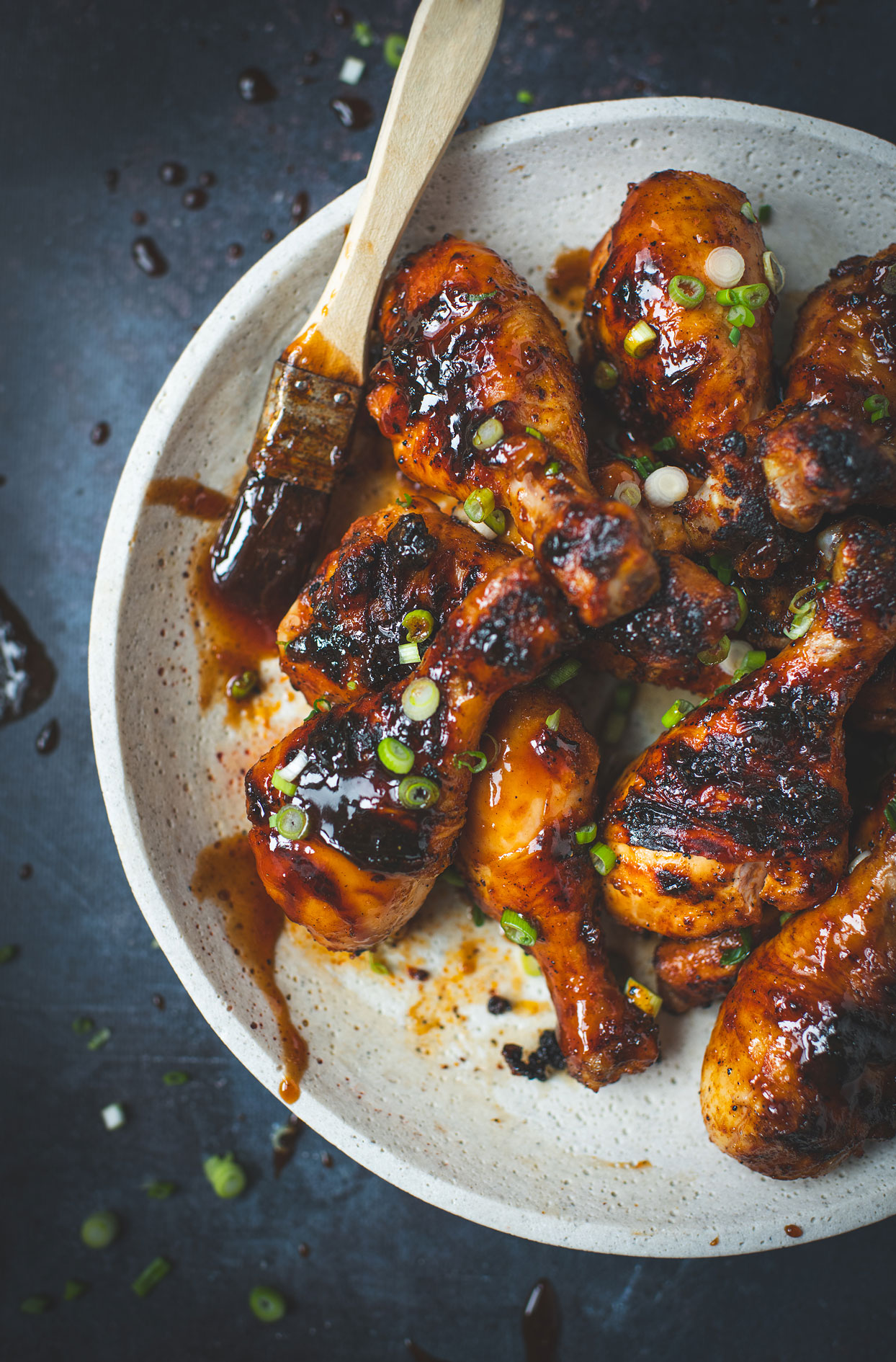 Grilled BBQ chicken drumsticks with maple syrup