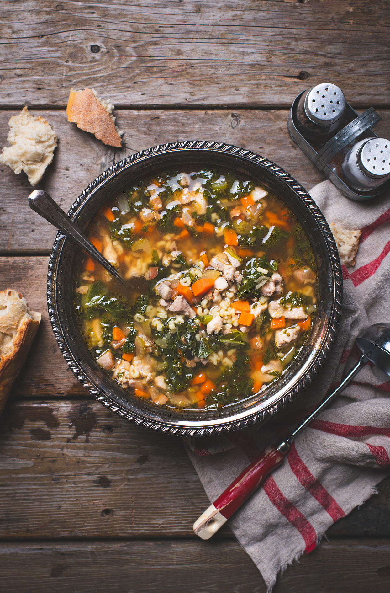 Chicken thigh soup with kale and crispy pancetta