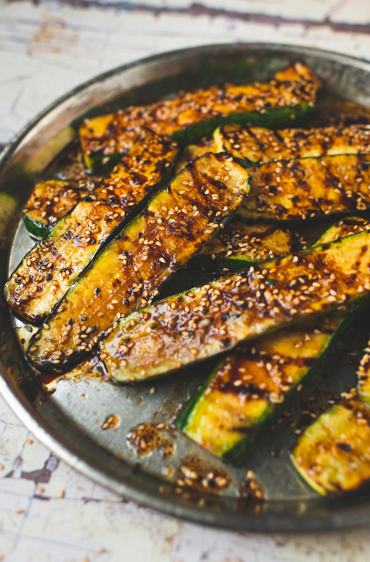 Grilled zucchini with sesame and maple marinade