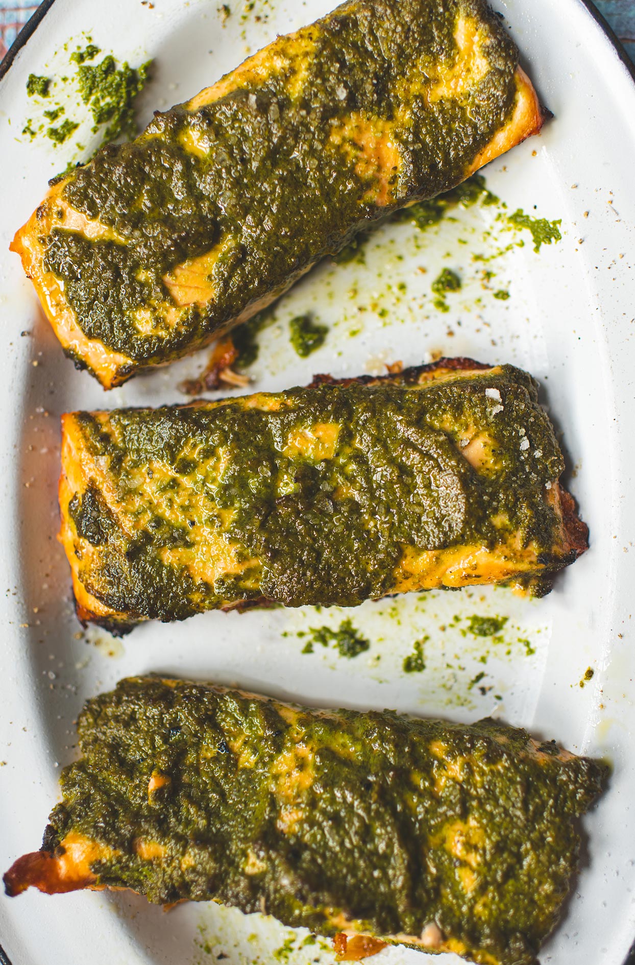 Grilled pesto salmon fillets on the barbecue
