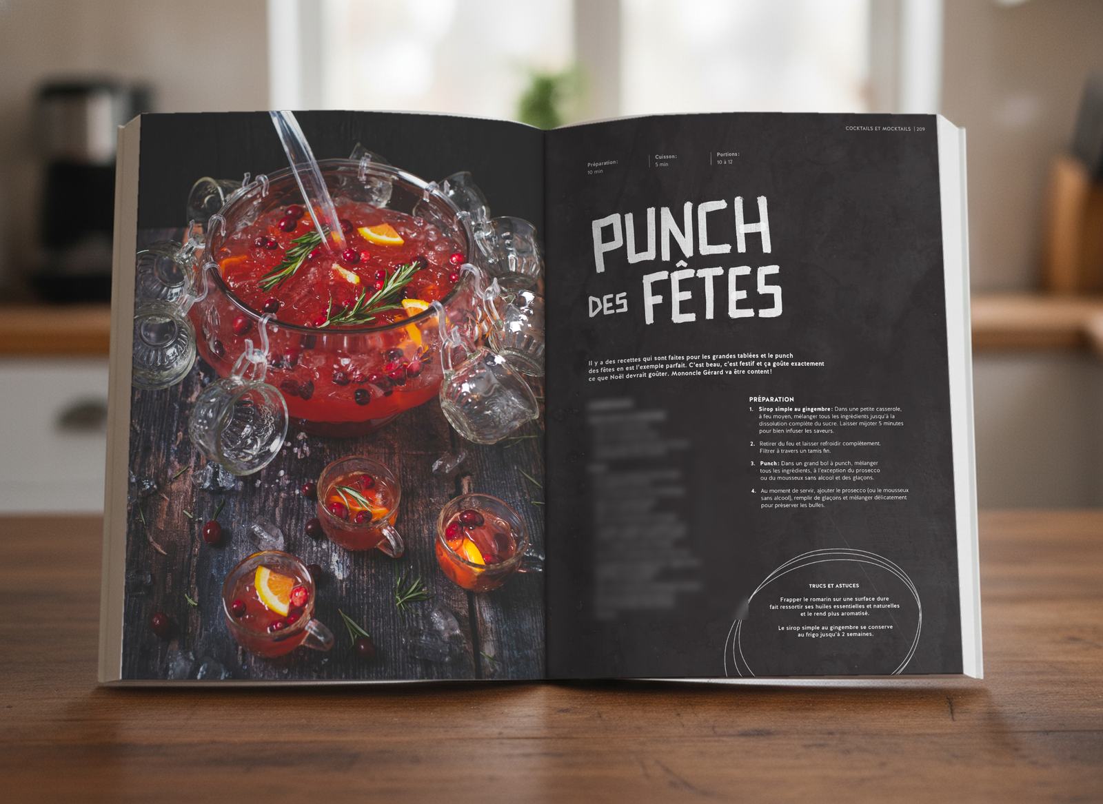 Livre ouvert à la recette du punch des fêtes, ingrédients floutés