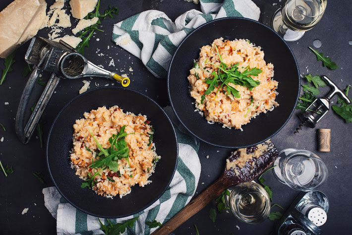 Risotto Aux Saucisses Italiennes Tomates Sechees Et Roquette Le